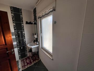 fully-tiled-bathroom