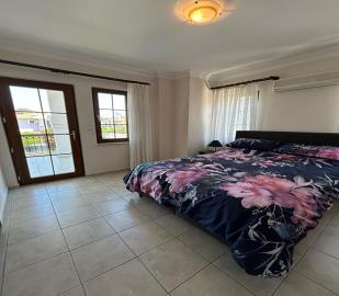 spacious-double-bedroom-with-access-to-balcony