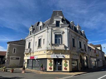 6456_immo_berthou_la_coquille_immeuble_bourg_2_locals_appartements--5-