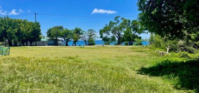 Lower Bay 1 Acre Prime Beachfront Land Image 2