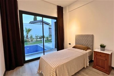 Exquisite Yalikavak Properties For Sale - Spacious bedroom with access outside