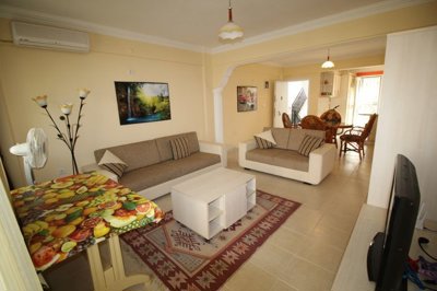 A Fully Furnished Didim Property In Sought After Complex – Lounge through to the dining area