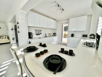 Blissful Detached Villa For Sale In Uzumlu, Fethiye - Stylish modern kitchen with a breakfast bar