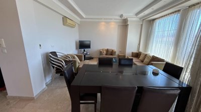 Immaculate Apartment In Belek, Antalya For Sale - Dining area through to the lounge