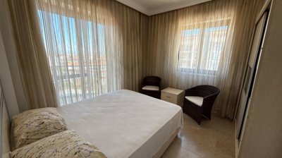Immaculate Apartment In Belek, Antalya For Sale - Master bedroom with a balcony