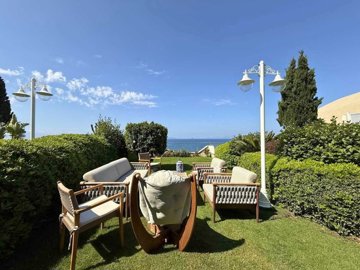 Seafront Property For Sale In Kadikalesi, Bodrum - Sea views from the lush garden