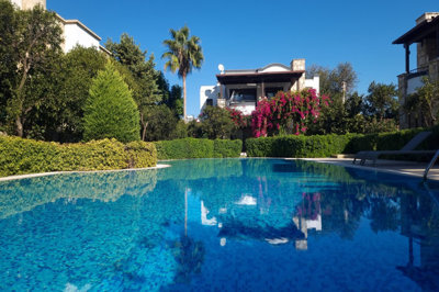 Tranquil Two-Bedroom Apartment In Bodrum For Sale - Main view of the apartment and pool