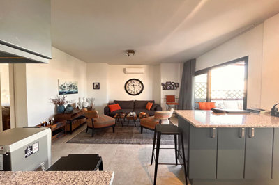 Tranquil Two-Bedroom Apartment In Bodrum For Sale - Kitchen through to the lounge