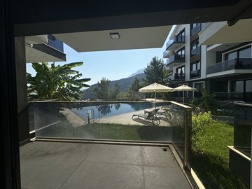 Nature View Fethiye Property For Sale - Lower floor balcony with pool views