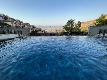 Nature View Fethiye Property For Sale - Communal pool with nature views