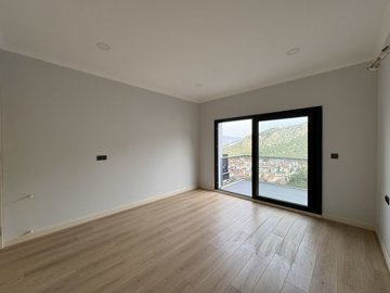 Nature View Fethiye Property For Sale - Living area with a nature-view balcony