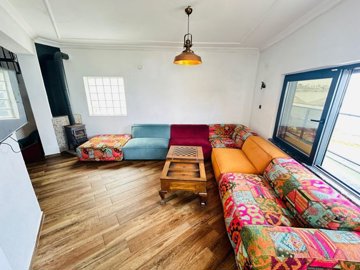 An Exceptional Didim Beachfront Villa For Sale – Lounge with wood burner