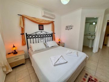 Lavish Reverse-Duplex Villa For Sale In Gocek, Fethiye - Master bedroom with ensuite shower room