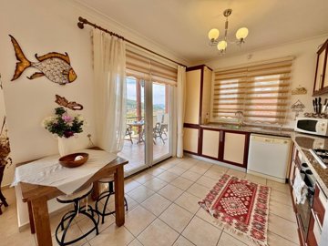 Lavish Reverse-Duplex Villa For Sale In Gocek, Fethiye - Kitchen with balcony access
