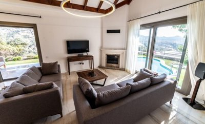 A Flawless Single-Storey Yalikavak Property For Sale - Lounge with a fireplace