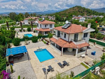 A Charming Detached Calis Villa For Sale - Arial view over the property and surroundings