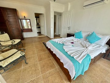 An Idyllic Detached Kalkan Villa For Sale - Double bedroom with an ensuite shower room