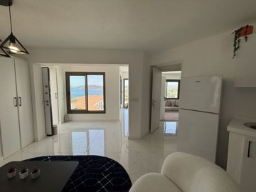 Chic Bodrum Property For Sale With A Shared Pool - Lounge to the bedroom