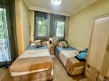 Ready-To-Move Semi-Detached Villa For Sale In Fethiye - Twin bedroom with ensuite and balcony