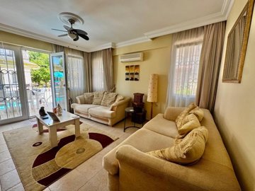 Ready-To-Move Semi-Detached Villa For Sale In Fethiye - Lounge with terrace and pool access