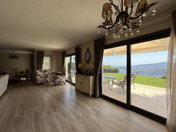 An Exquisite Triplex Villa In Bodrum With A Large Garden - spacious living room with sea view terrace and garden