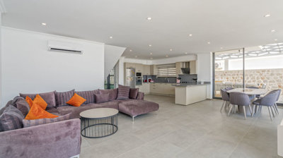 Exceptional Kalkan Triplex Villa For Sale - Lounge to the modern kitchen
