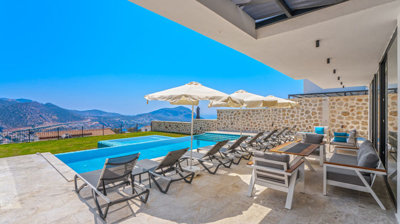 Exceptional Kalkan Triplex Villa For Sale - Lounging terrace poolside