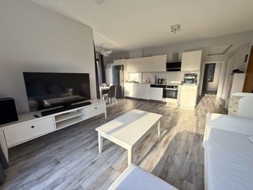 Alluring Garden Apartment In Bodrum For Sale - Lounge to the kitchen