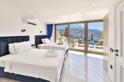 A Luxury 5-Bedroom Sea View Antalya Villa For Sale - Twin bedroom with access to the terraces with full sea views