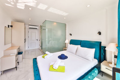 A Luxury 5-Bedroom Sea View Antalya Villa For Sale - First floor bedroom with balcony and sea views