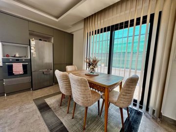 Modern Fethiye Property For Sale - Dining area with exterior access