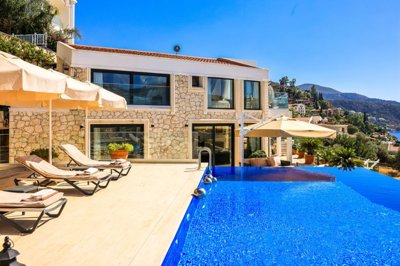 Sensational Villa In Kalkan For Sale With A Private Infinity Pool & Sea Views - Infinity pool and sunbathing terraces