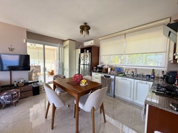Inviting Apartment For Sale In Bodrum - Dining area and kitchen