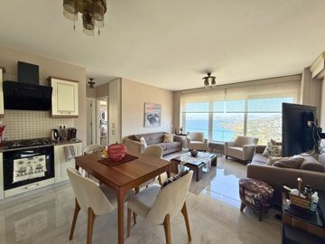 Inviting Apartment For Sale In Bodrum - Open-plan living area with sea views