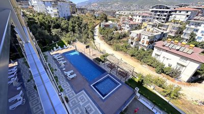 Sophisticated Apartment For Sale In Alanya – Views over the pool
