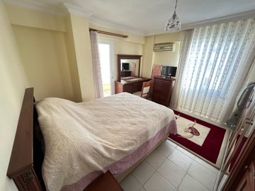 Furnished Property With A Sea View For Sale In Altinkum, Didim – Spacious double bedroom with a balcony