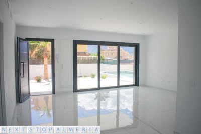 Open plan living space with patio doors closed